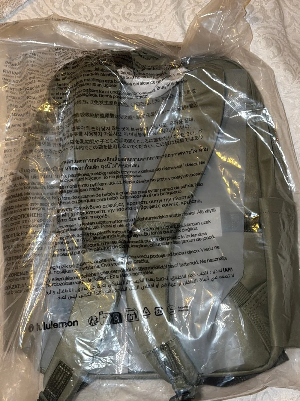 Green everywhere lululemon backpack with gold hardware